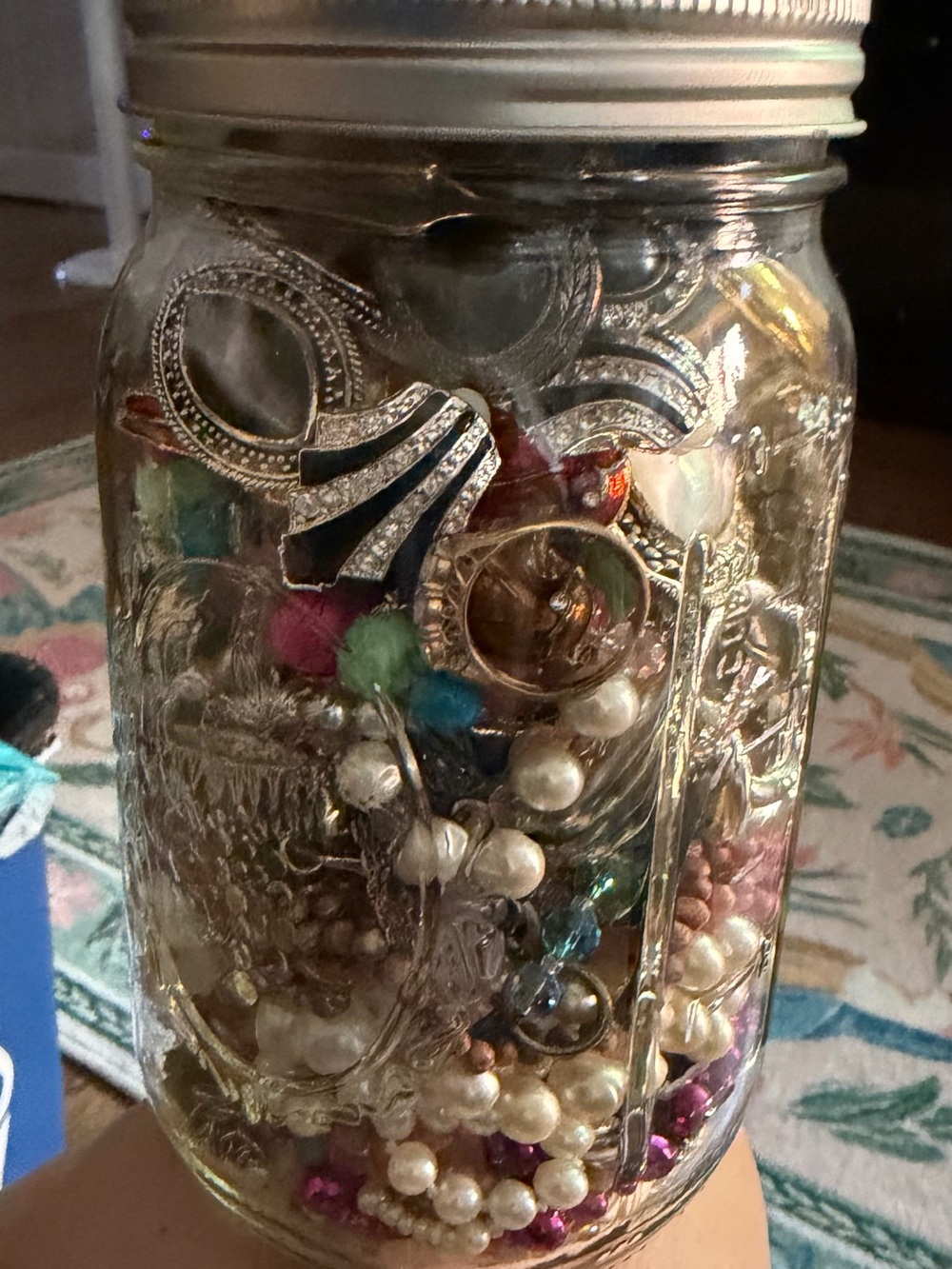 Multiple Clear Glass Qt Jar Filled with vintage beads, earrings, bracelets etc.